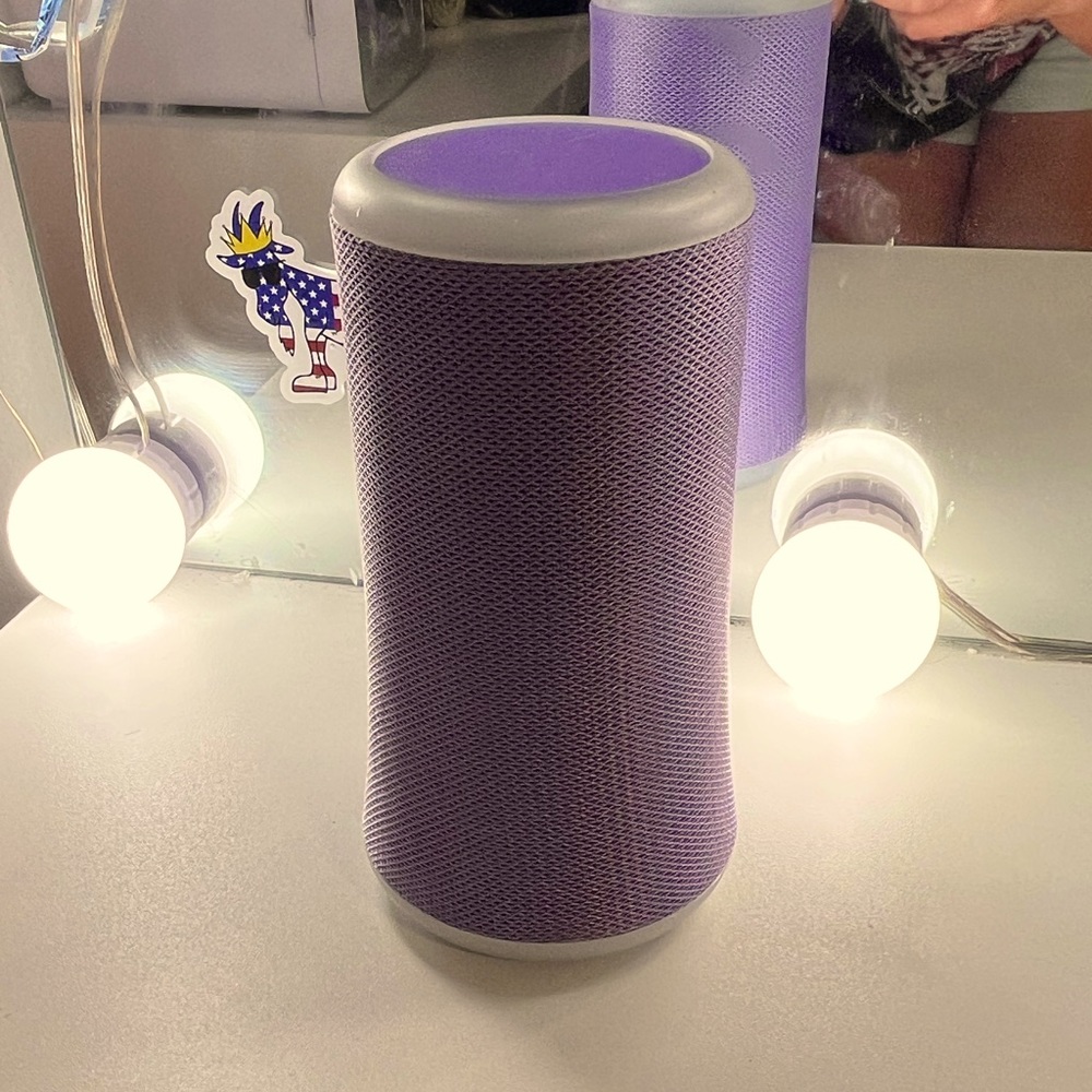 BASS JAXX. Wireless. Purple. Color changing speaker. 52 mm. Comes with charger.